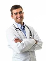 Confident male doctor in white lab coat and stethoscope standing with folded arms smiling at the camera isolated on white photo