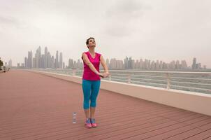 woman stretching and warming up photo