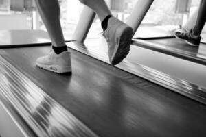 sportsman exercise jogging on treadmill photo