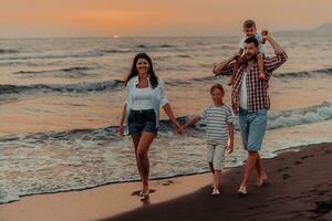 Family gatherings and socializing on the beach at sunset. The family walks along the sandy beach. Selective focus photo