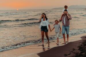 Family gatherings and socializing on the beach at sunset. The family walks along the sandy beach. Selective focus photo