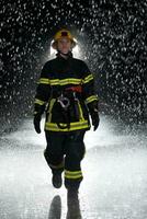 Portrait of a female firefighter standing and walking brave and optimistic. photo