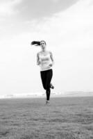 woman jogging at morning photo