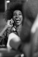 portrait of a young successful African-American woman in modern office photo