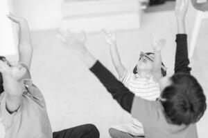 young boys having fun on the floor photo