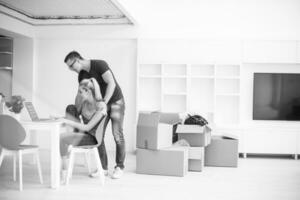 Young couple moving in a new home photo