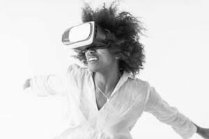 black girl using VR headset glasses of virtual reality photo