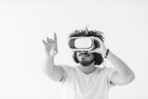 Man using headset of virtual reality photo