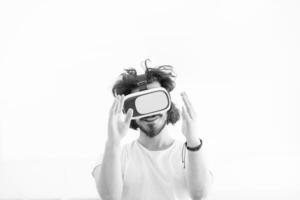 Man using headset of virtual reality photo