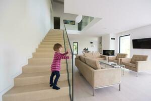 family with little girl enjoys in the modern living room photo