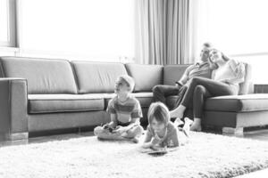 couple spending time with kids photo