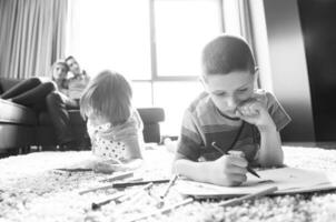 young couple spending time with kids photo