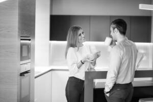 A young couple is preparing for a job and using a laptop photo