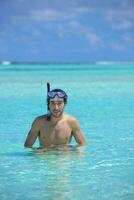 young guy with diving mask photo