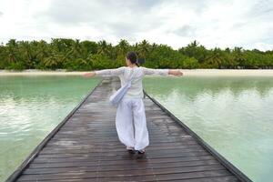 young woman relax on cloudy summer day photo