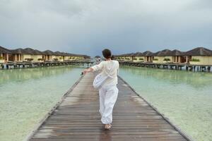 young woman relax on cloudy summer day photo