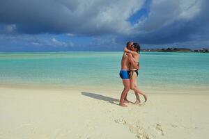 happy young  couple at summer vacation have fun and relax at beach photo