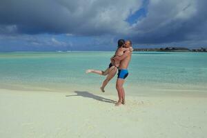 happy young couple have fun on summer photo