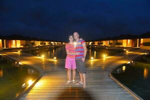 happy young  couple at summer vacation have fun and relax at beach photo