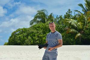 photographer taking photo on beach