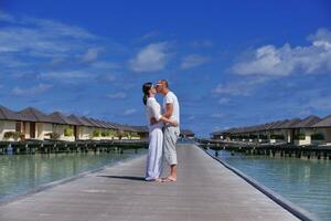 happy young  couple at summer vacation have fun and relax at beach photo