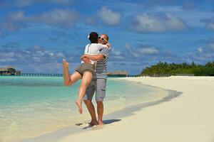 happy young couple have fun on summer photo
