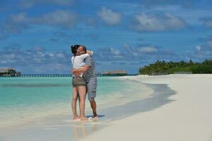happy young  couple at summer vacation have fun and relax at beach photo