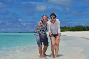 happy young couple have fun on summer photo