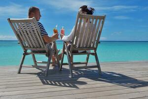happy young couple relax and take fresh drink photo