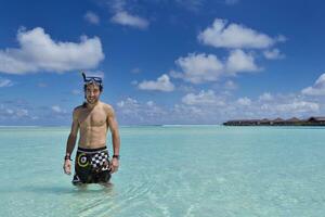 young guy with diving mask photo