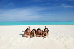 group of happy young people have fun on bach photo