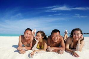 group of happy young people have fun on bach photo