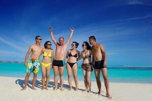 group of happy young people have fun on bach photo