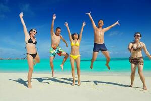 group of happy young people have fun on bach photo