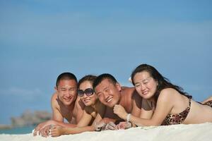 group of happy young people have fun on bach photo