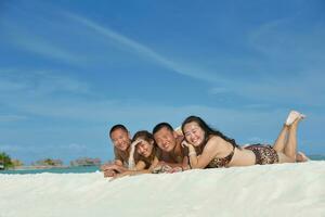 group of happy young people have fun on bach photo