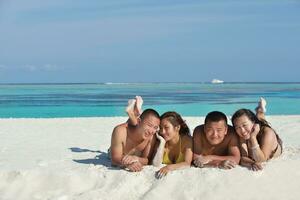 group of happy young people have fun on bach photo