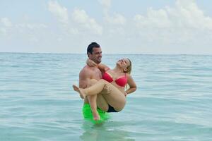 happy young  couple at summer vacation have fun and relax photo