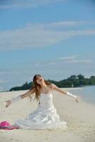 asian bride on beach photo