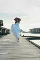 asian bride on beach photo