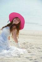 asian bride on beach photo