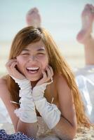 asian bride on beach photo