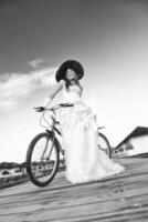 asian bride on beach photo