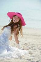 asian bride on beach photo