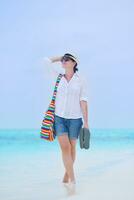 beautiful gril on beach have fun photo
