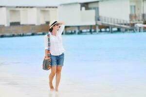 beautiful gril on beach have fun photo