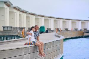 happy young couple have fun on beach photo