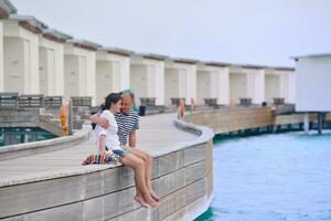 happy young couple have fun on beach photo