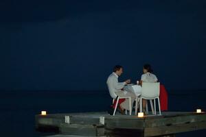 romantic couple have outdoor dinner photo