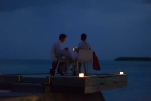 romantic couple have outdoor dinner photo